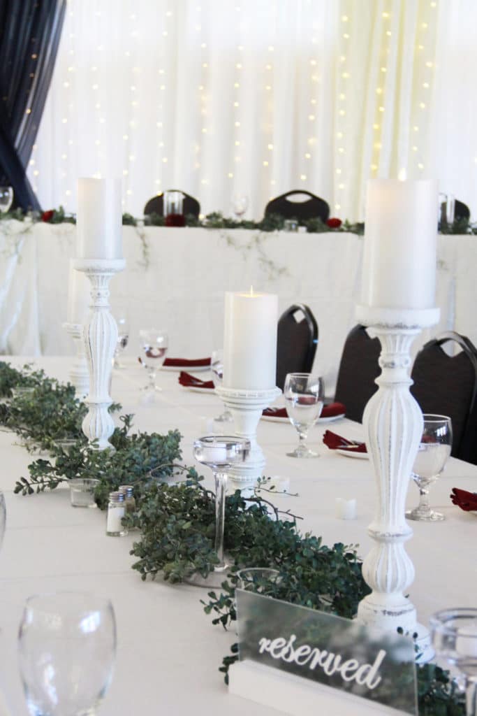 Pillar Candle Wedding Table Décor With Greenery