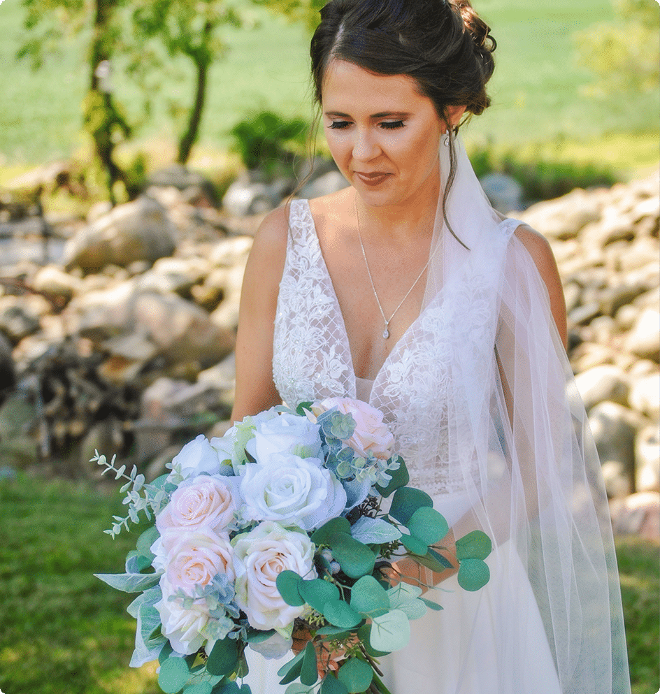 Bride Admiring Faux Flower Bouquet