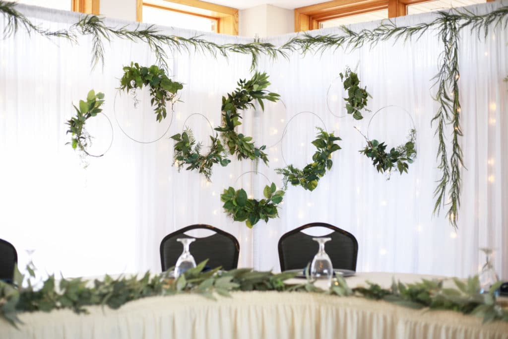 Head Table Backdrop With Greenery Hoops