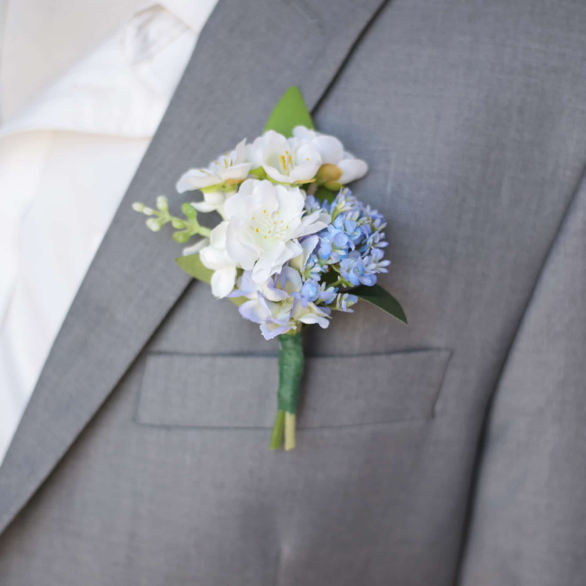 Blue and White Silk Flower Boutonniere