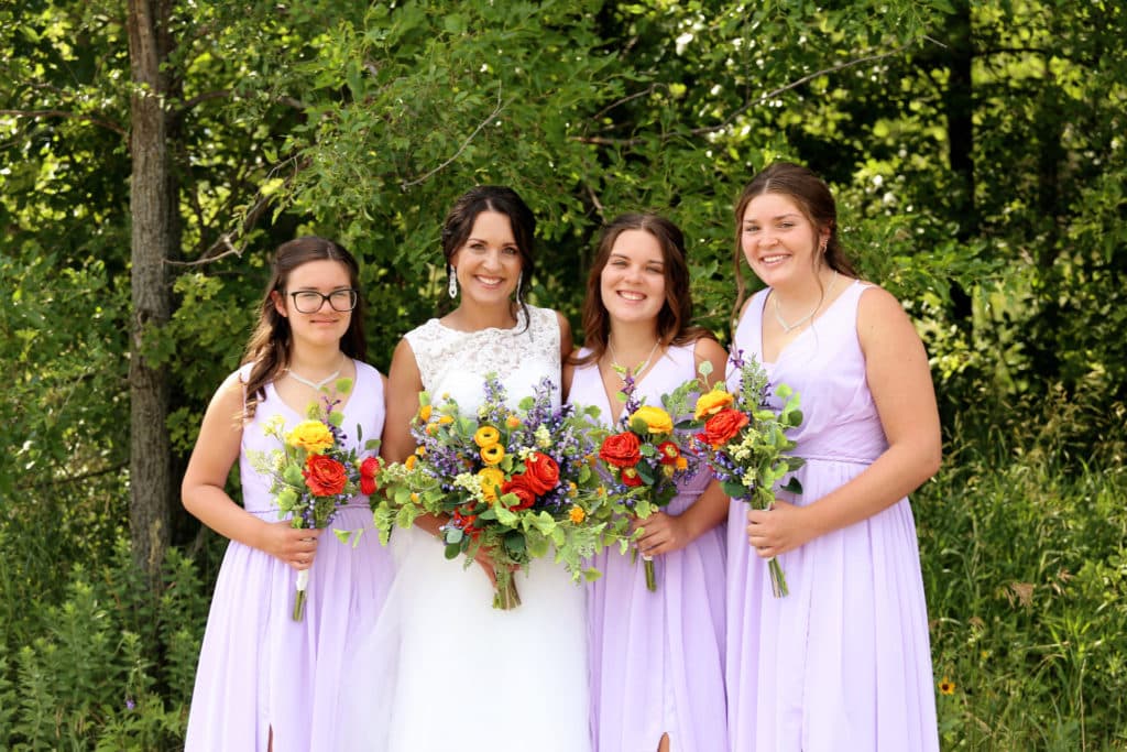 Bridesmaids in Lilac with Faux Colorful Bouquets