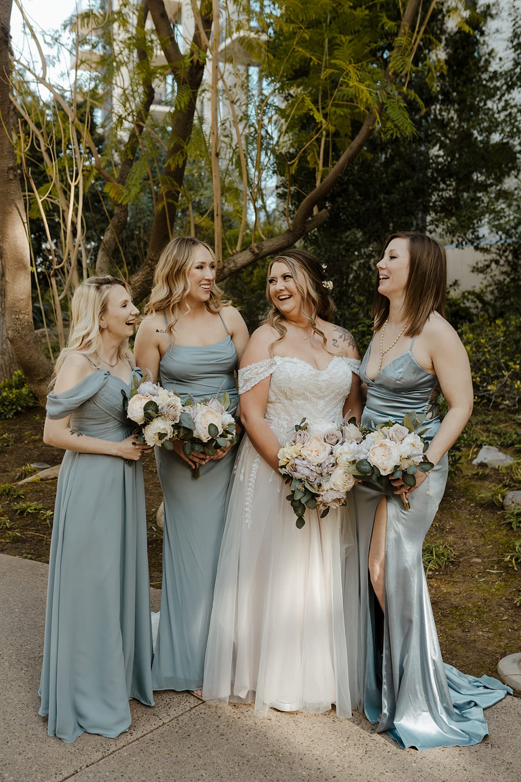 Silk Blue Bridesmaid Dresses with Pastel Bouquet